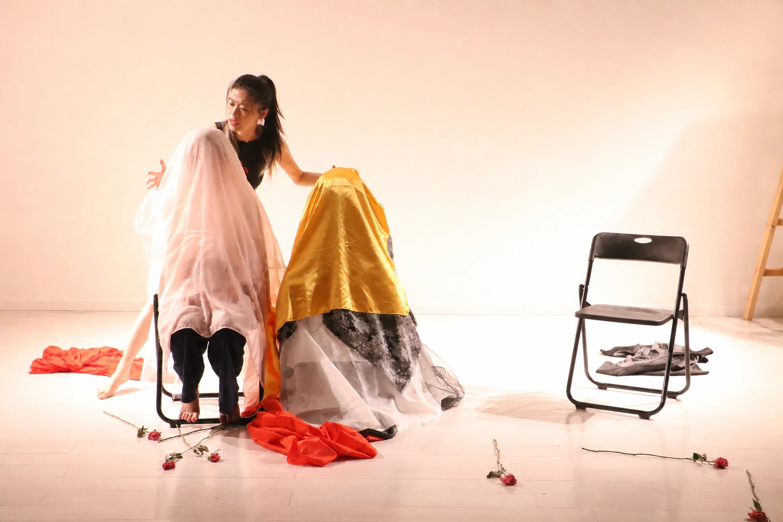 A facilitator guiding participants through an expressive psychodrama performance